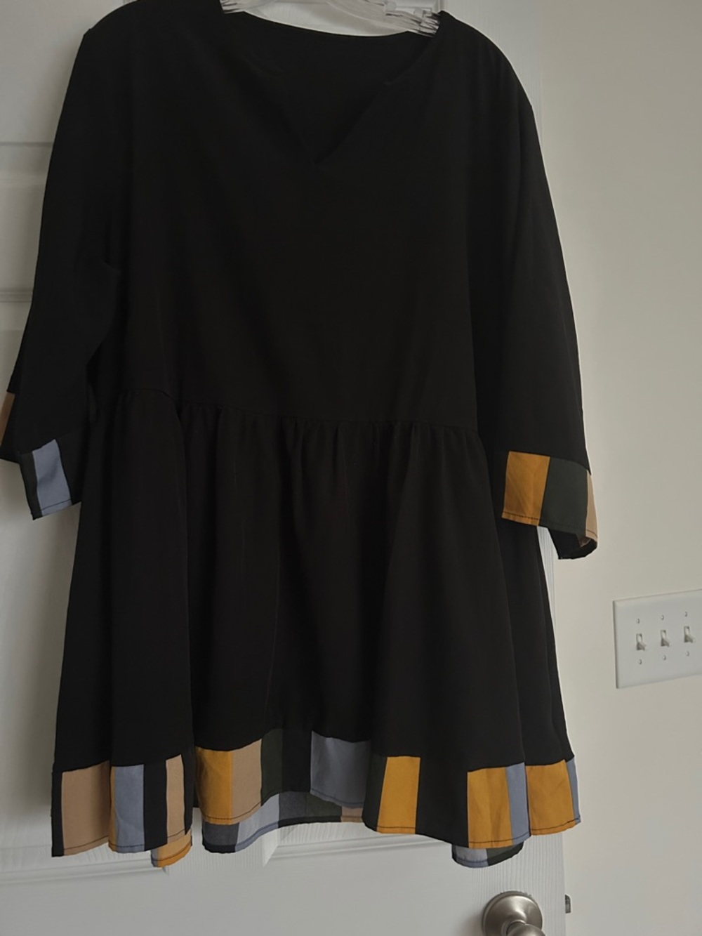 Black Peplum tunic with Colorblock Trim